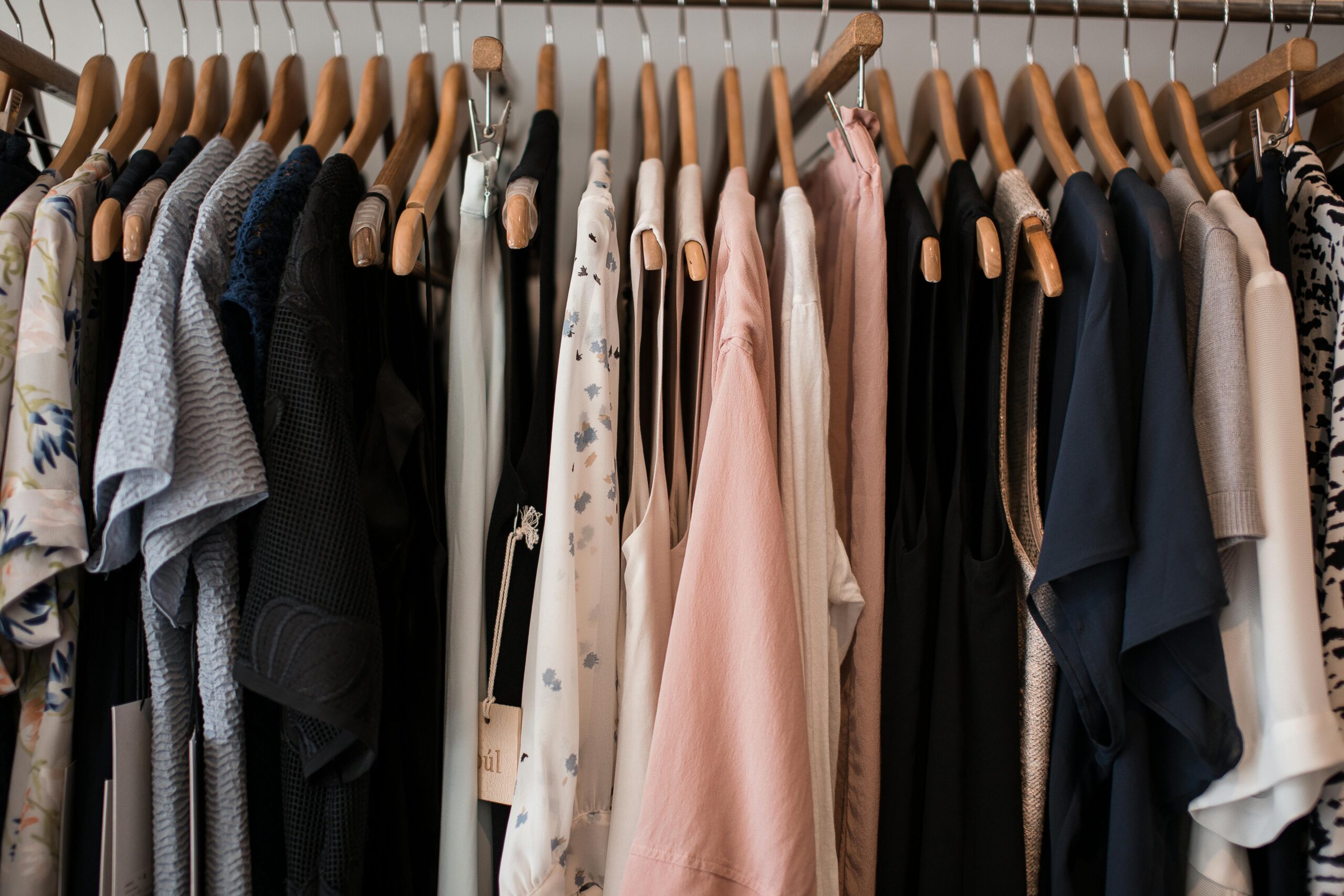 Women Clothes on Hangers in Shop